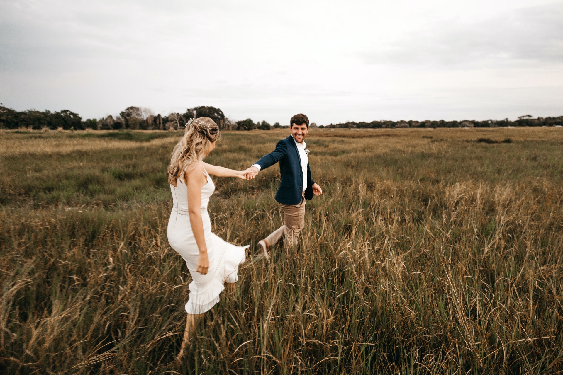 Couple walking on grass